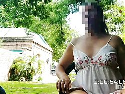 latina showing her tits in a public park rubbing her pussy without panties